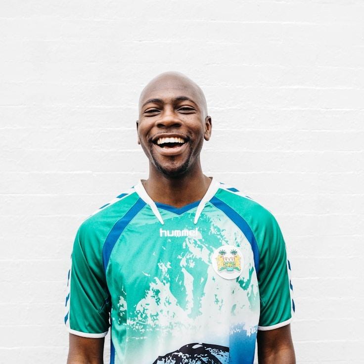 Kaveri Mehta, Lead Design Curator at HarborFrameworks, reviewing corporate floral arrangements